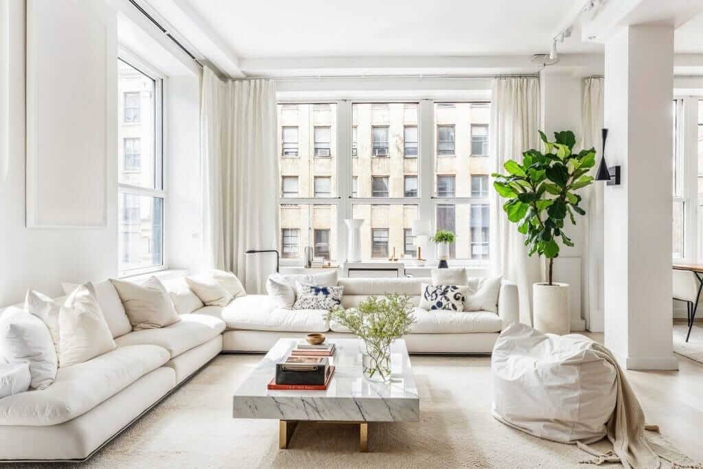 A beautifully finished modern living room with pristine painted walls